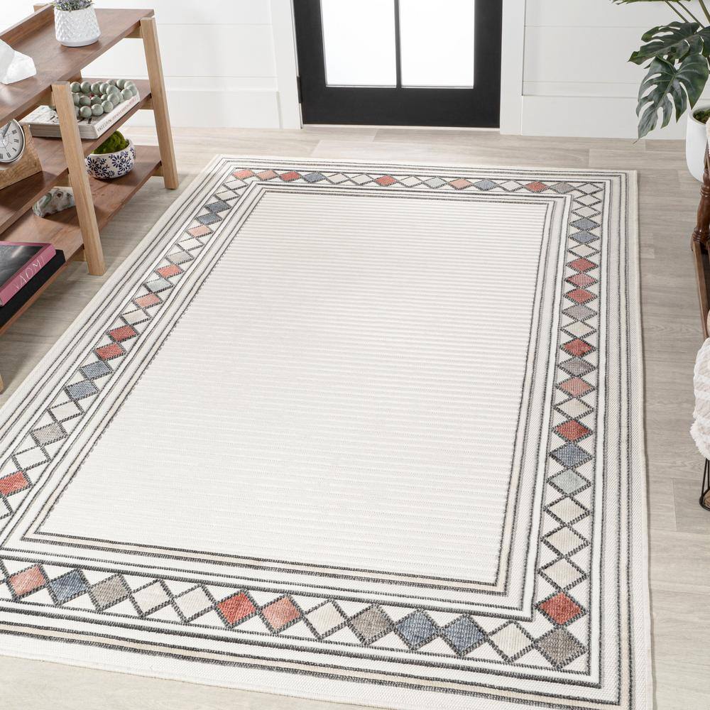 Ivory and Beige Geometric Synthetic 3' x 5' Indoor/Outdoor Rug