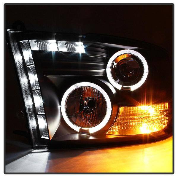 Dodge Ram 1500 09-16 / Ram 2500/3500 10-16 Projector Headlights - Halogen  Model Only- LED Halo- Black