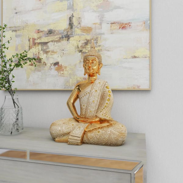 Litton Lane Gold Polystone Meditating Carved Buddha Sculpture with Intricate Carvings and Mirrored Embellishments