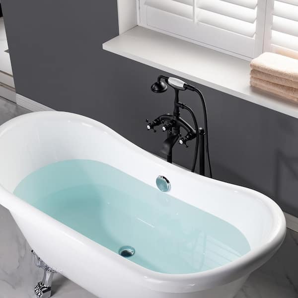 https://images.thdstatic.com/productImages/d7128adc-8628-4805-a1db-1a9353cdcbd4/svn/matte-black-woodbridge-claw-foot-tub-faucets-f1083-1f_600.jpg