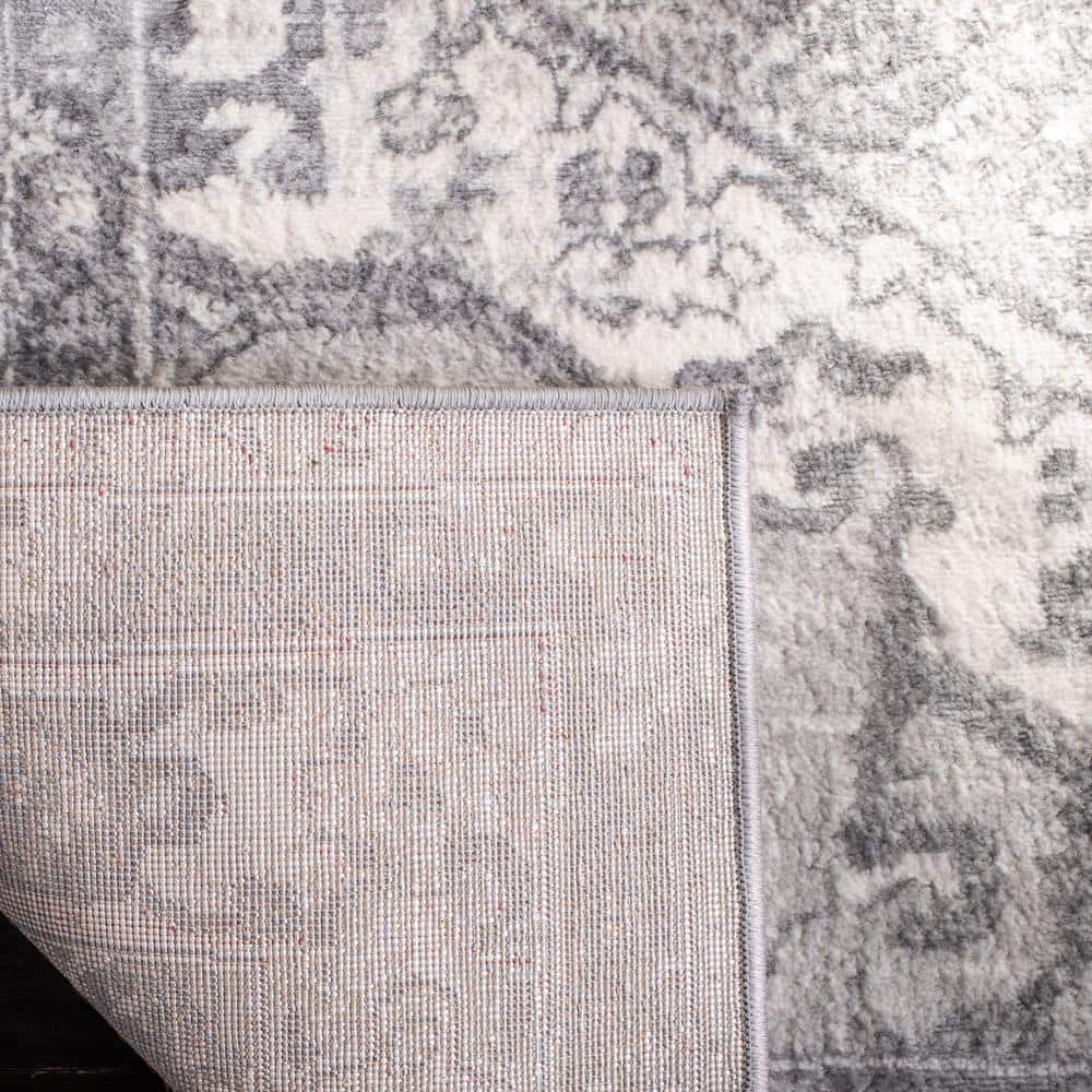 Cream and Grey Rectangular 4' x 6' Stain-Resistant Synthetic Area Rug