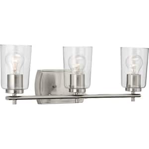 Adley Collection 23 in. 3-Light Brushed Nickel Clear Glass New Traditional Bathroom Vanity Light