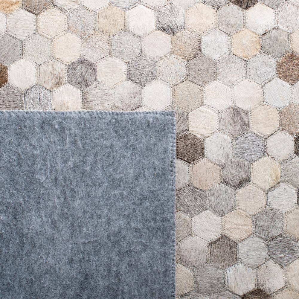 Geometric Patchwork Cowhide Area Rug in Cream and Gray - 5' x 8'