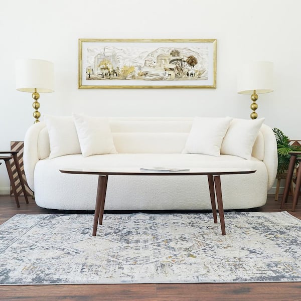 Ashcroft Furniture Co Elvis 53 in. Ivory Oval Solid Wood Coffee Table