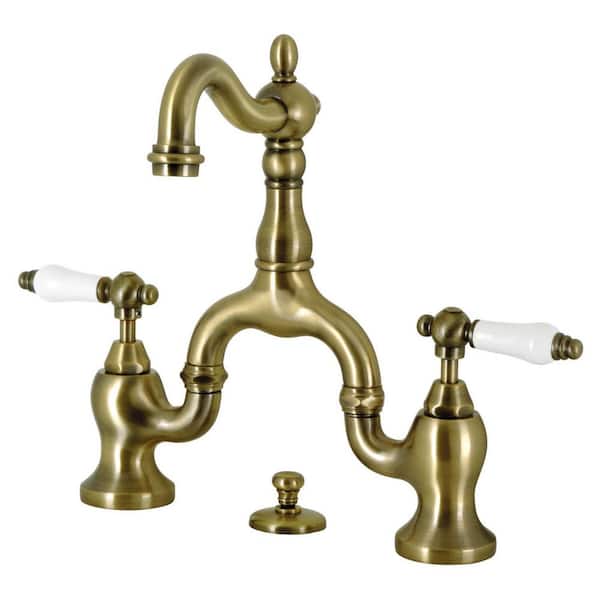 Kingston Brass English Country Bridge 8 in. Widespread 2-Handle Bathroom Faucet with Brass Pop-Up in Antique Brass