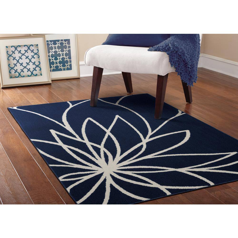 Indigo and Ivory Floral Synthetic 5' x 7' Area Rug