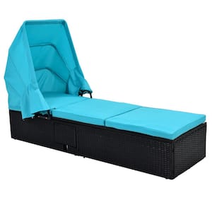Long Reclining Outdoor Wicker Chaise Lounge with Blue Cushions Canopy and Cup Table