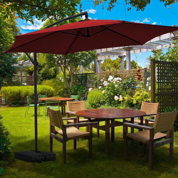 cantilever offset patio umbrella Sonkuki 11 ft. Octagon Aluminum Cantilever Patio Umbrella, Foot-controlled 360 rotation with a Base in Black