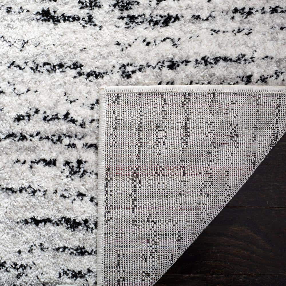 Ivory and Silver Synthetic Rectangle Area Rug, 10' x 14'