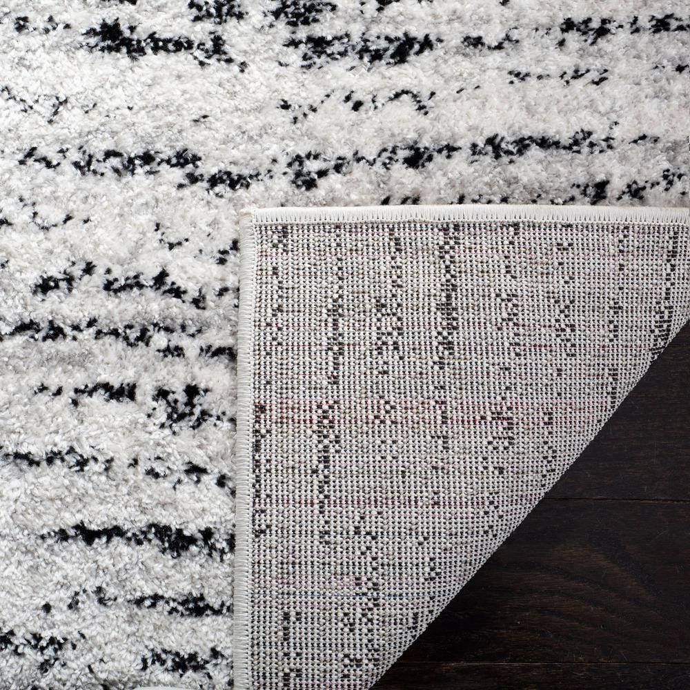 Ivory and Silver Synthetic Rectangle Area Rug, 10' x 14'
