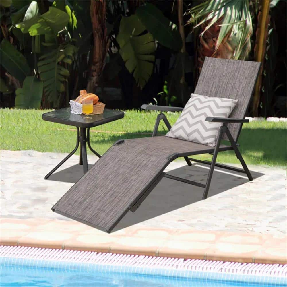 Gray outdoor chaise lounge by a swimming pool