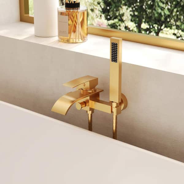 Single Handle Wall Mount Waterfall Roman Tub Faucet with Hand Shower in Brushed Gold (Valve Included)