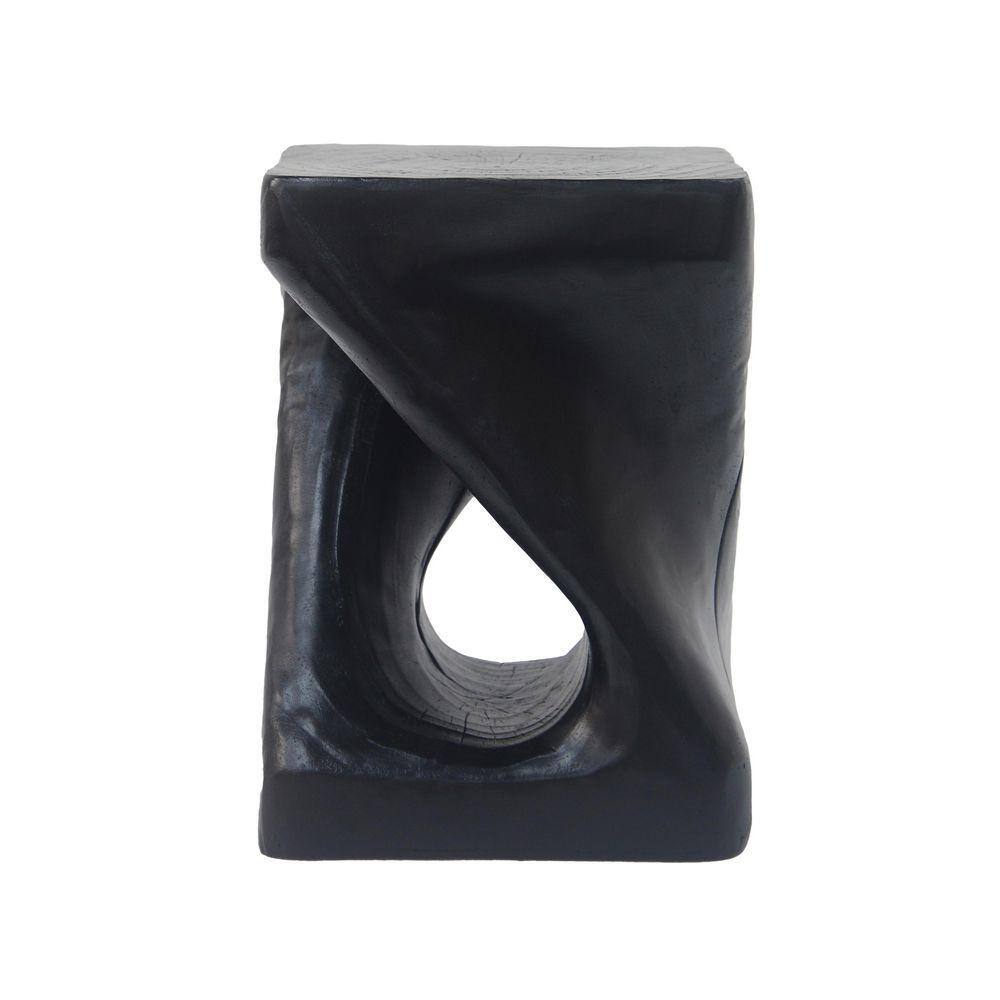 Side view of a black twist-shaped side table.
