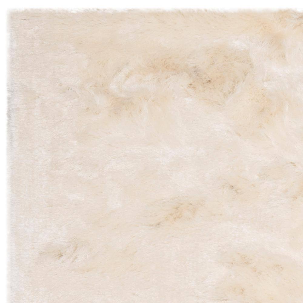Ivory Tufted Shag 5' x 7' Wool and Synthetic Rug