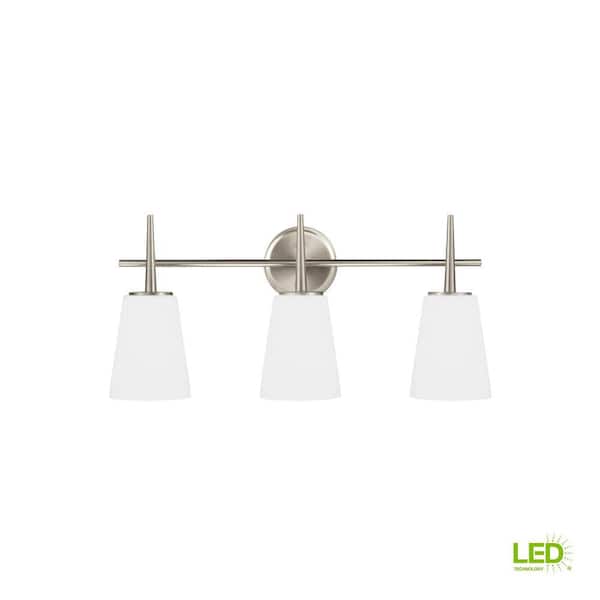 Generation Lighting - Driscoll 24.5 in. 3-Light Contemporary Modern Brushed Nickel Wall Bathroom Vanity Light with White Glass and LED Bulbs