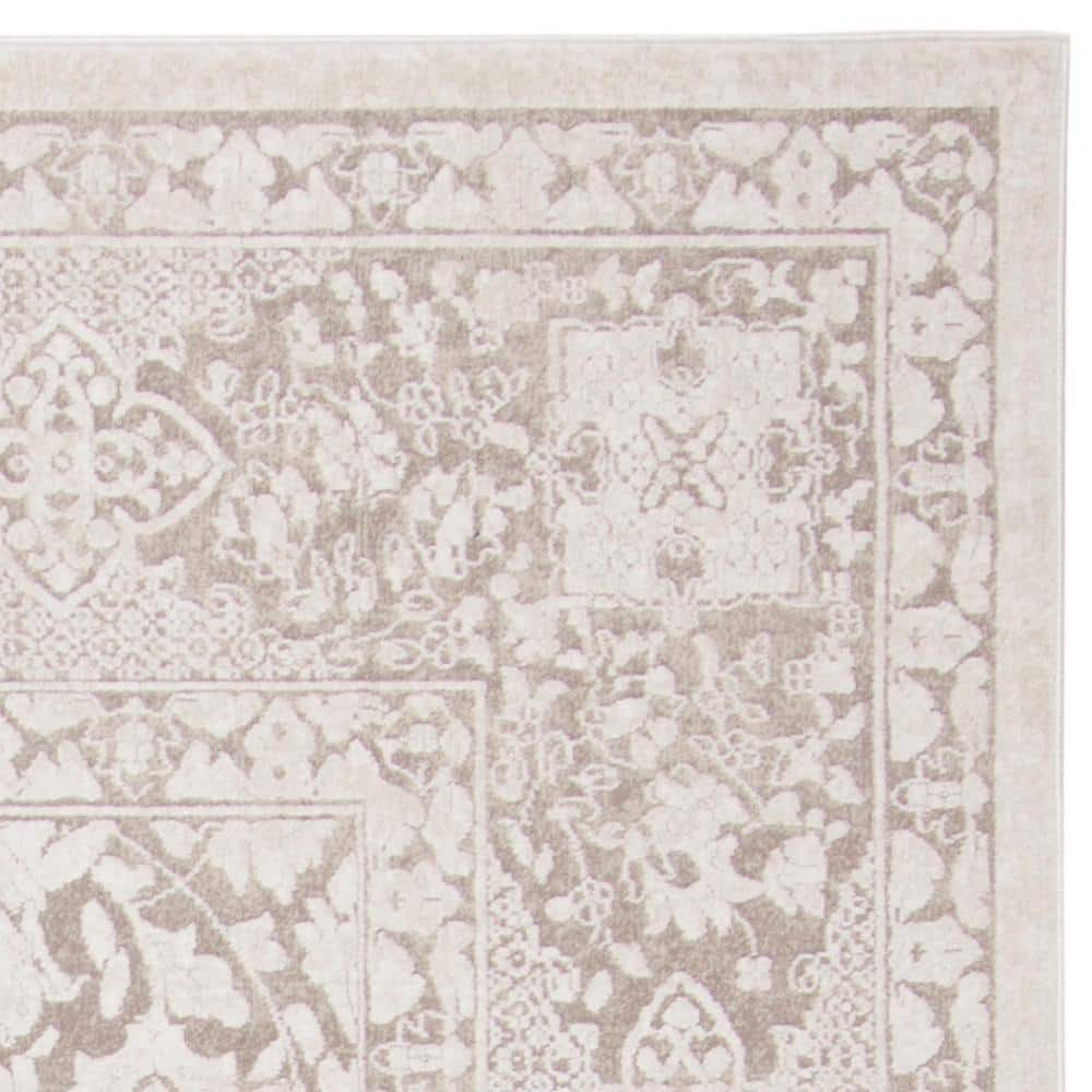 Elegant Floral Etched Beige/Cream 8' x 10' Synthetic Area Rug