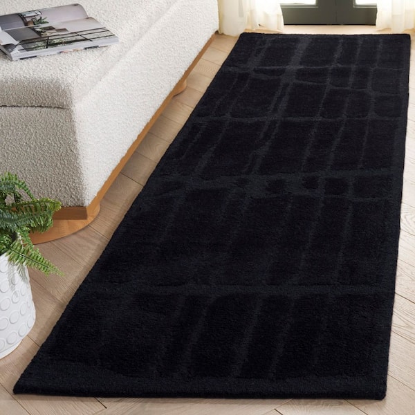 Rodeo Drive 2 ft. x 8 ft. Black Solid Abstract Tile Runner Rug