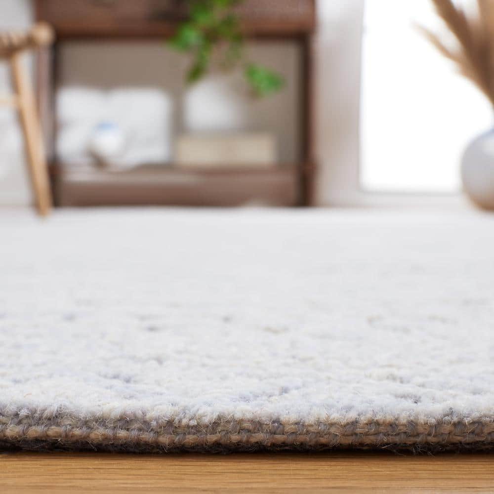 Grey and Ivory Geometric Hand-Tufted Wool Area Rug