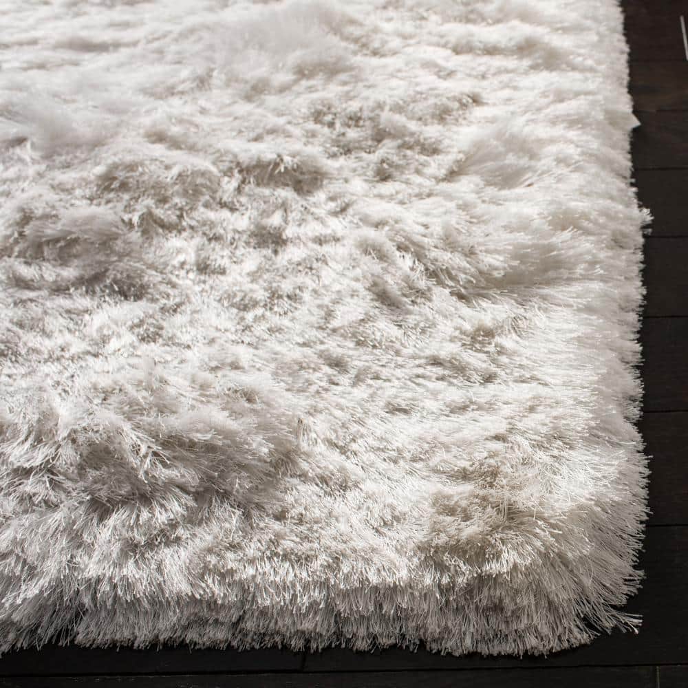 Ivory Hand-Tufted Shag Synthetic 9' x 12' Area Rug