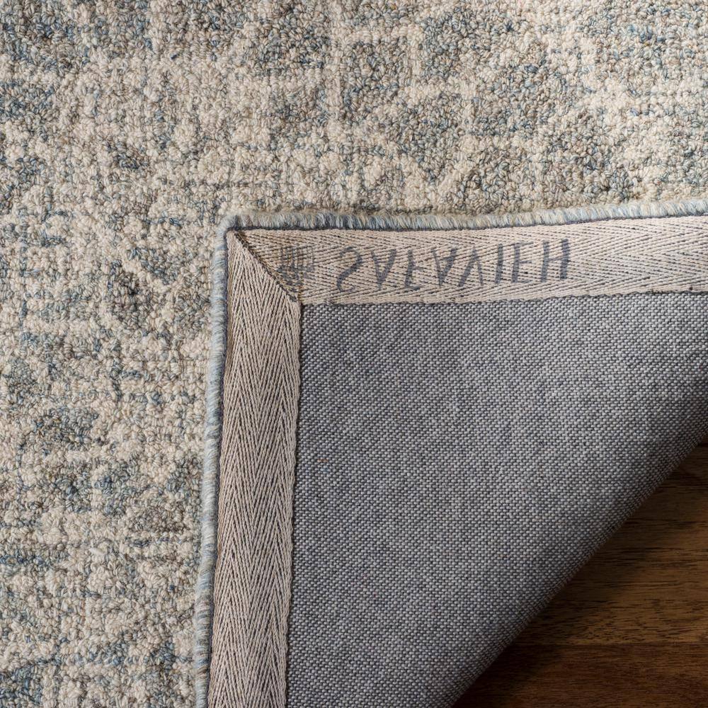 Ivory and Grey Handmade Wool Abstract Tufted Rug