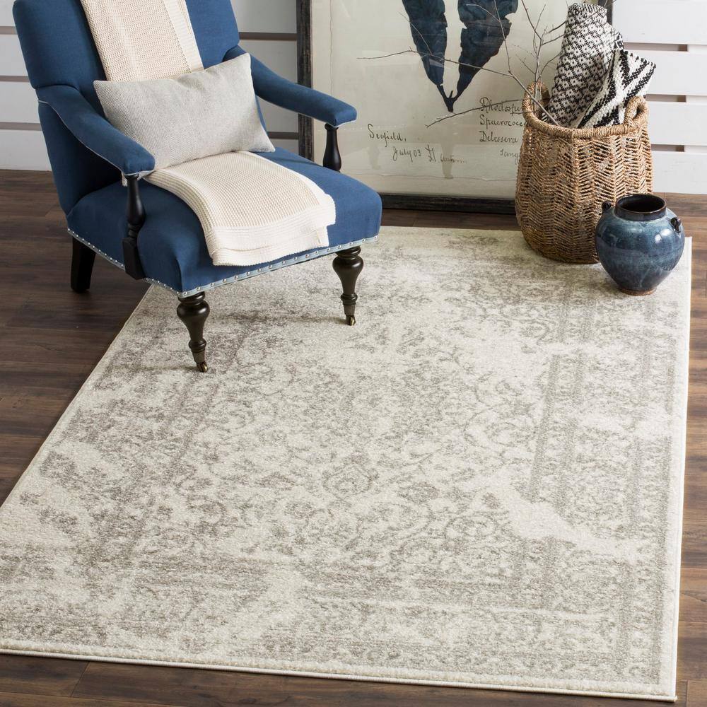 Ivory and Silver Floral Rectangular 5' x 7' Area Rug