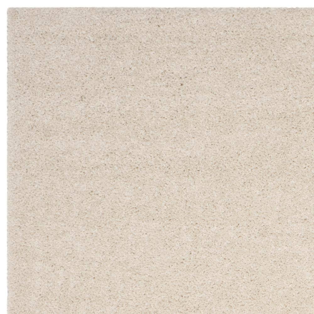Cream 8' x 10' Tufted Shag Area Rug