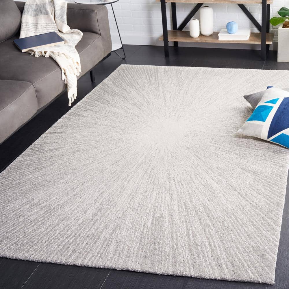 Ivory and Silver Tufted Wool Abstract 4' x 6' Rug