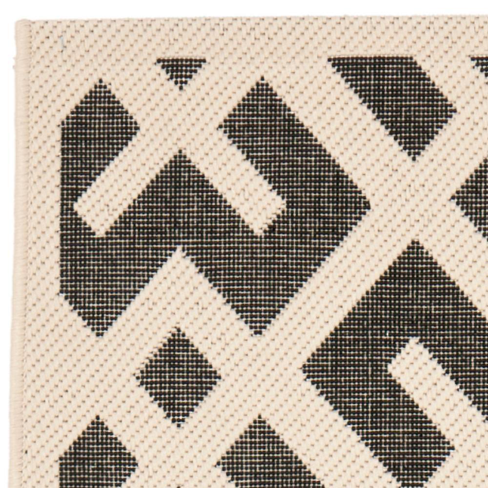 Black and Beige Geometric Synthetic Indoor/Outdoor Rug, 2'-4" x 14'
