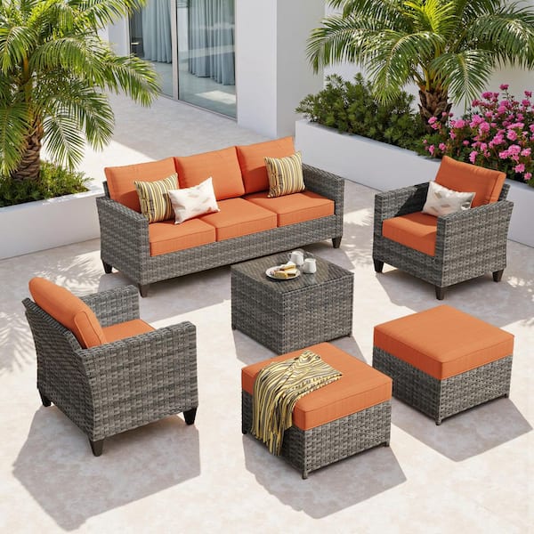 Camden 6-Piece Wicker Outdoor Patio Furniture Patio Conversation Set with Orange Red Cushion, Ottoman and Coffee Table