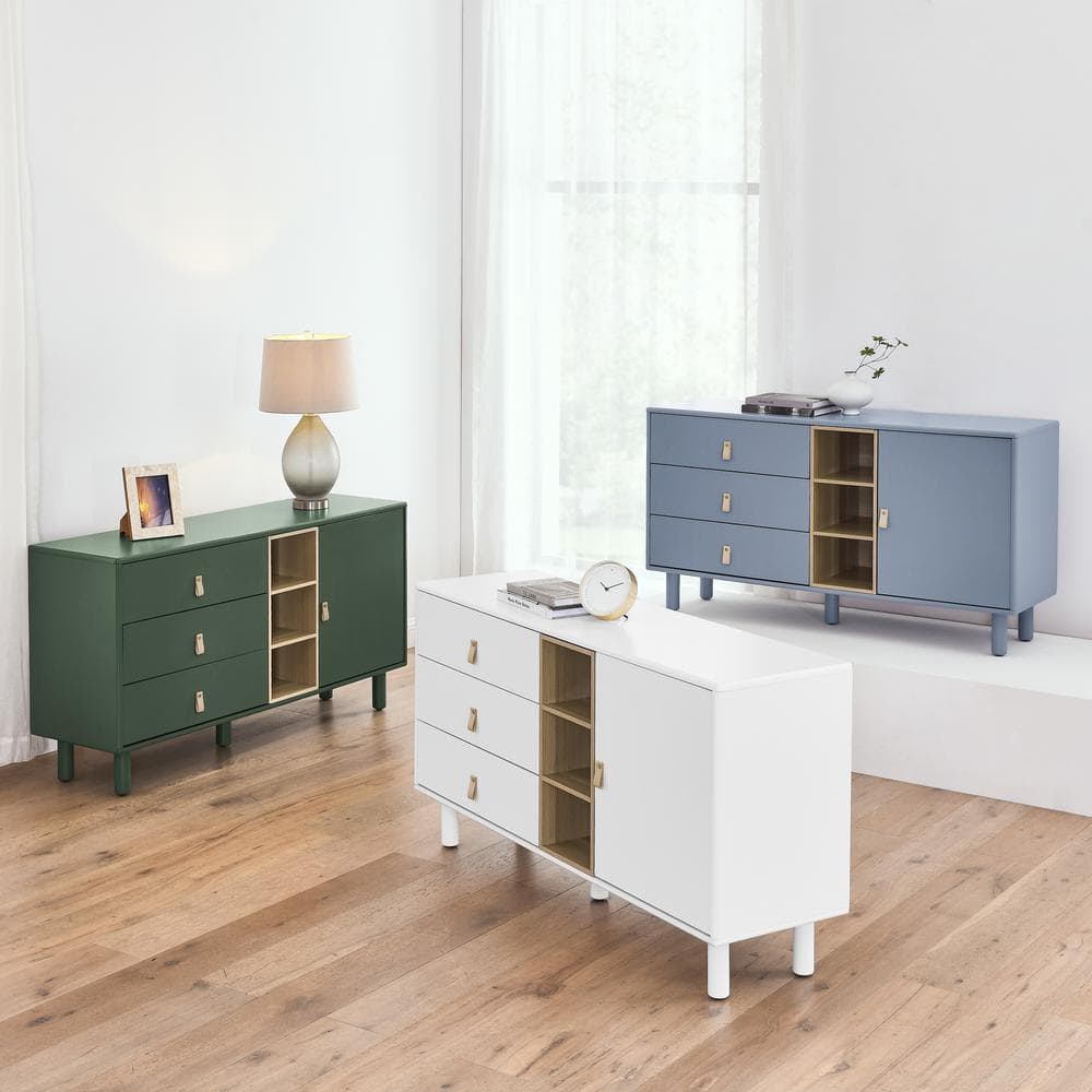 Three modern storage cabinets in white, forest green, and slate blue.