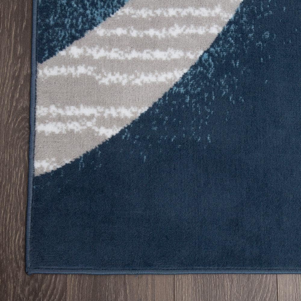 Gray and Blue Geometric 8' x 10' Synthetic Area Rug