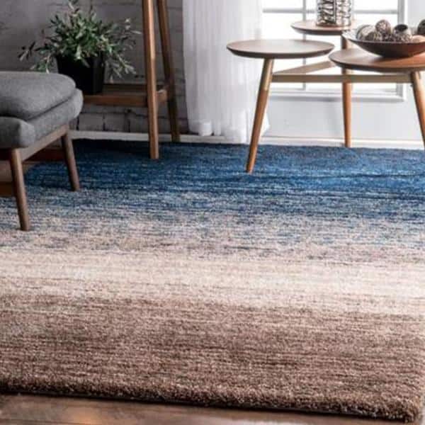 https://images.thdstatic.com/productImages/d8be2895-3cba-4b1f-8c61-0359a5aca39f/svn/navy-multi-nuloom-area-rugs-hjzom1h-89012-e1_600.jpg