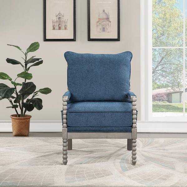 blue upholstered arm chair