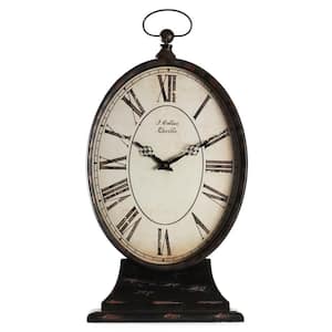 Antique Black Oval Iron Table Clock on Base with a Top Ring