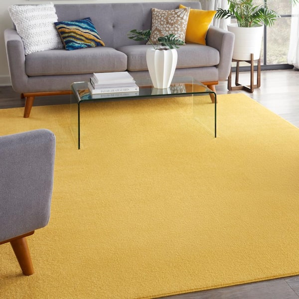Essentials 6 ft. x 9 ft. Yellow Solid Contemporary Indoor/Outdoor Patio Area Rug