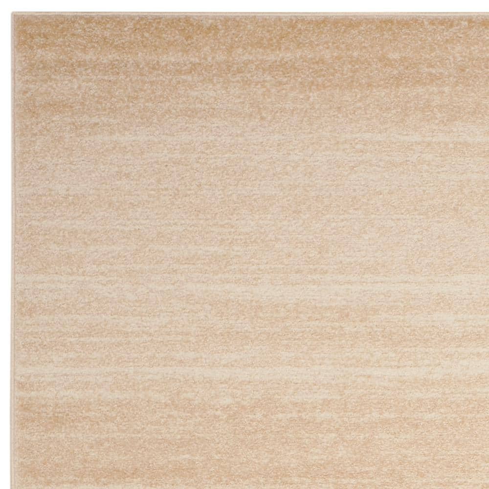 Champagne and Cream 9' x 12' Synthetic Stripe Area Rug
