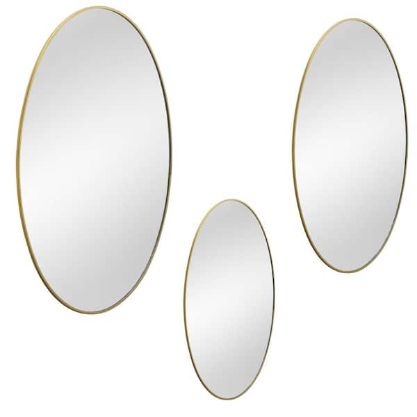 SCOTT LIVING . 5-in. W x 13.77-in. H Gold Trim Framed Oval Mirrors, Set of 3
