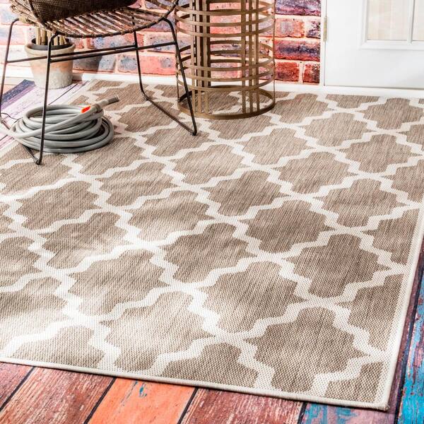https://images.thdstatic.com/productImages/d93a2f9e-5a11-4d88-a9fc-c6b345adc7bb/svn/taupe-nuloom-outdoor-rugs-owdn06a-51109-31_600.jpg