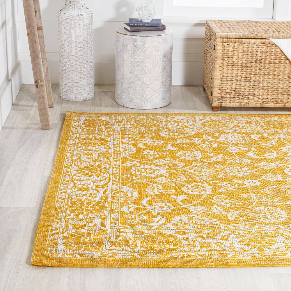 9' x 12' Yellow and Cream Floral Synthetic Rectangular Rug