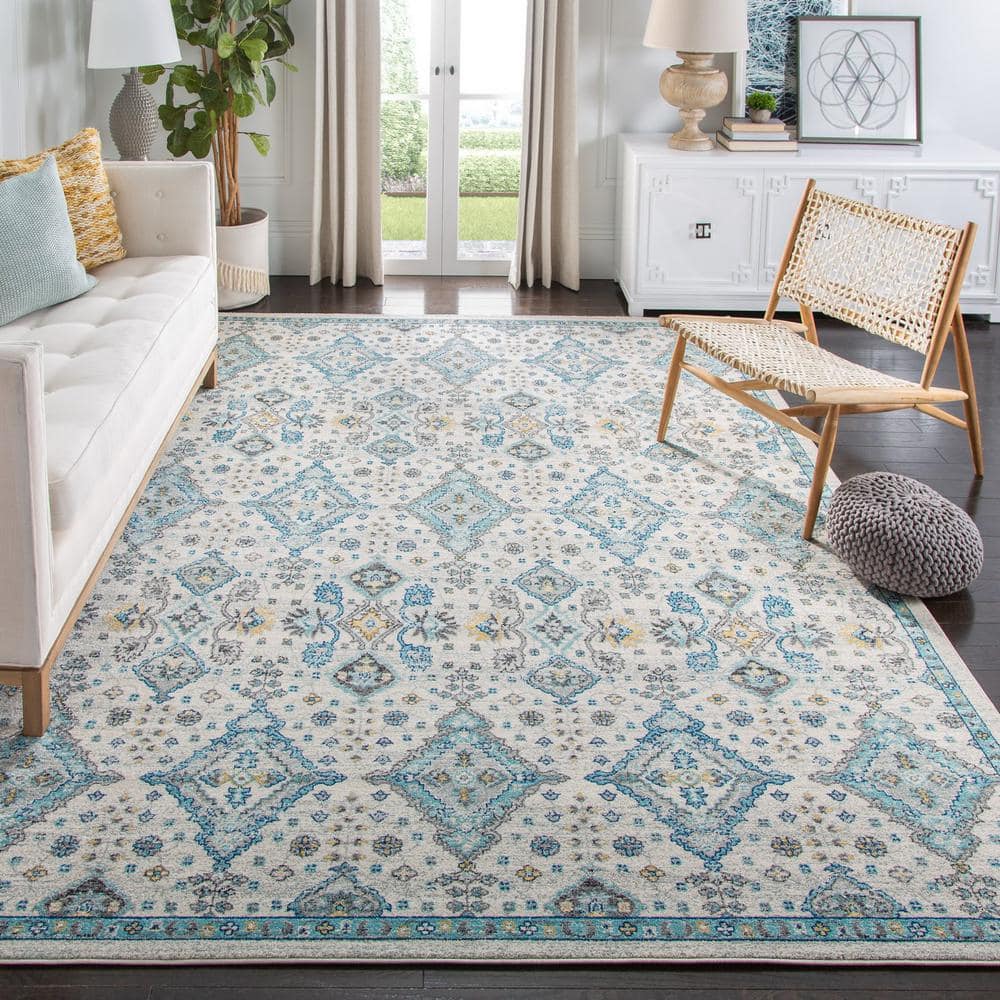 Ivory and Light Blue Floral Synthetic 9' x 12' Rectangular Area Rug