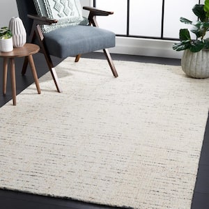 Abstract Ivory/Blue 5 ft. x 8 ft. Speckled Area Rug