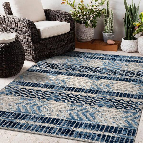 https://images.thdstatic.com/productImages/d9693e68-3b4c-4393-a61f-f2c912a89e2e/svn/navy-world-rug-gallery-outdoor-rugs-8019navy8x10-4f_600.jpg