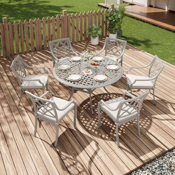 7-Piece Gray Cast Aluminum Round Outdoor Dining Set with Beige Cushions