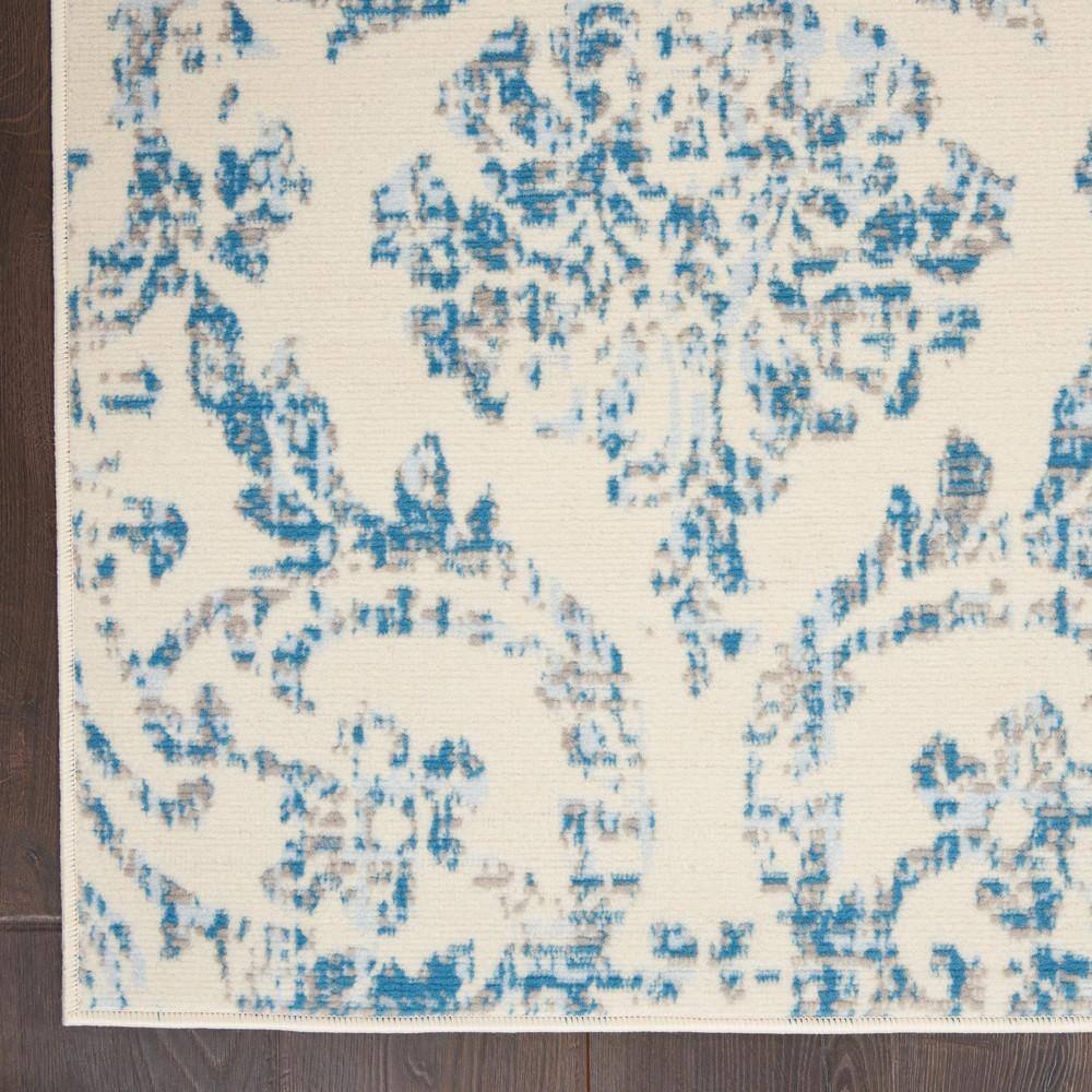 Elegant Ivory and Blue Damask 5' x 7' Synthetic Area Rug
