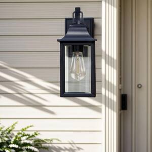 Decorators 14 in. Sand Black Farmhouse Cylinder Dusk to Dawn Outdoor Hardwired Cylinder Glass Sconce