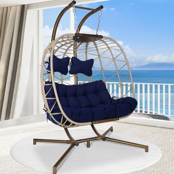 NICESOUL 2 Person Outdoor Beige Wicker Swing Egg Chair with Golden Stand and Navy Blue Cushions