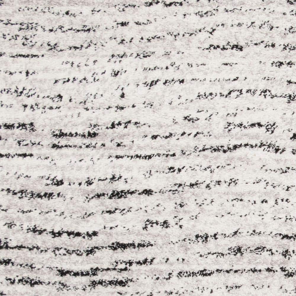Ivory and Silver Synthetic Rectangle Area Rug, 10' x 14'