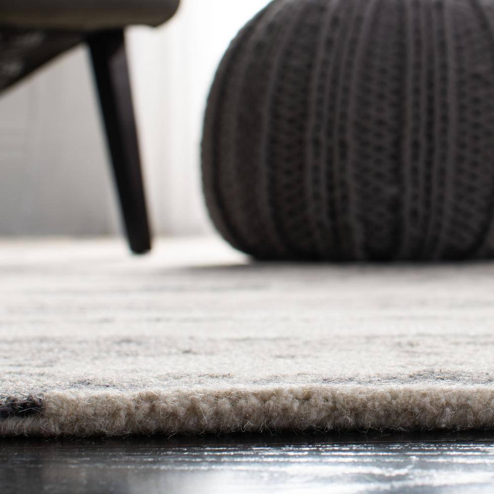 Handmade Tufted Charcoal/Ivory Round Wool Area Rug