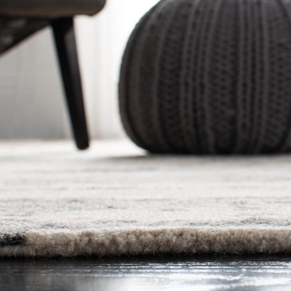 Handmade Charcoal and Ivory Wool 9' x 12' Abstract Tufted Rug