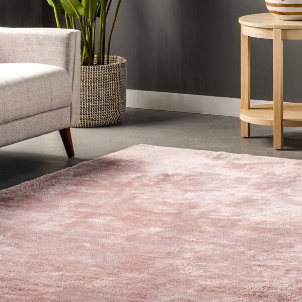 https://images.thdstatic.com/productImages/d9a45fbb-d3c3-590d-8a14-104c6454a4d5/svn/pink-nuloom-area-rugs-bivd01h-609-4f_600.jpg